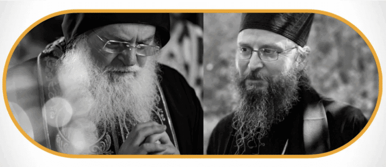 Δύο Ορθόδοξοι ιερείς με γένια και ράσα, εστιασμένοι στην πνευματικότητα.