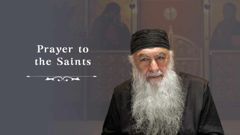 Elderly man with long white beard, wearing a black cap and robe, with "Prayer to the Saints" text