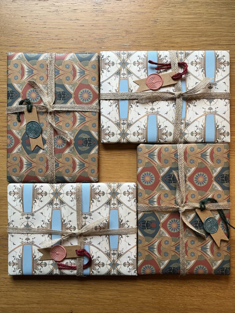 Ornate Wrapped Gifts With Wax Seals gallery image