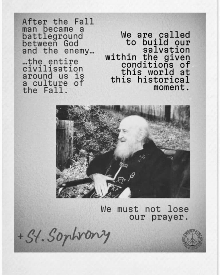 Elderly bearded man sitting outdoors quoting St. Sophrony