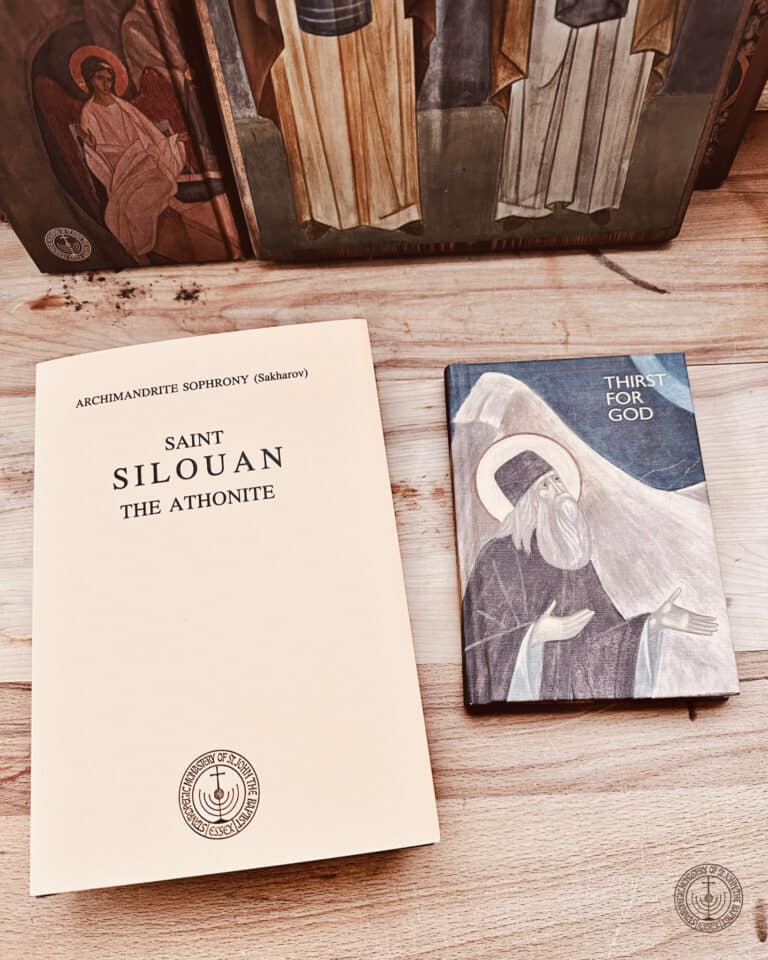 Saint Silouan the Athonite book and Thirst for God book on wooden table