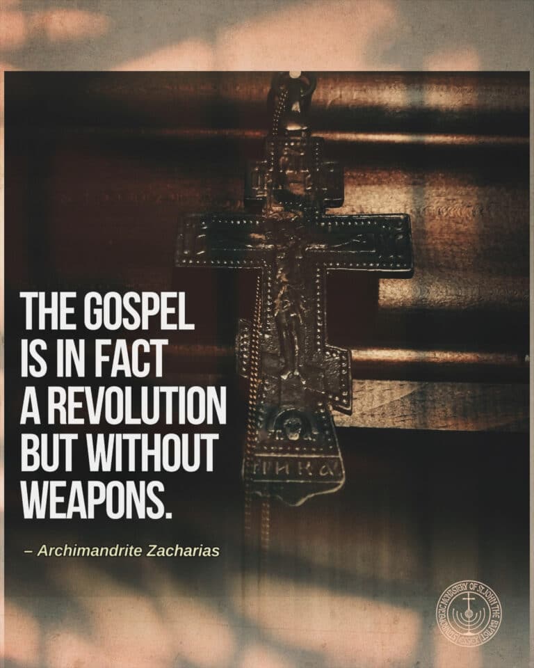 Orthodox Christian cross with text: "The Gospel is in fact a revolution but without weapons.
