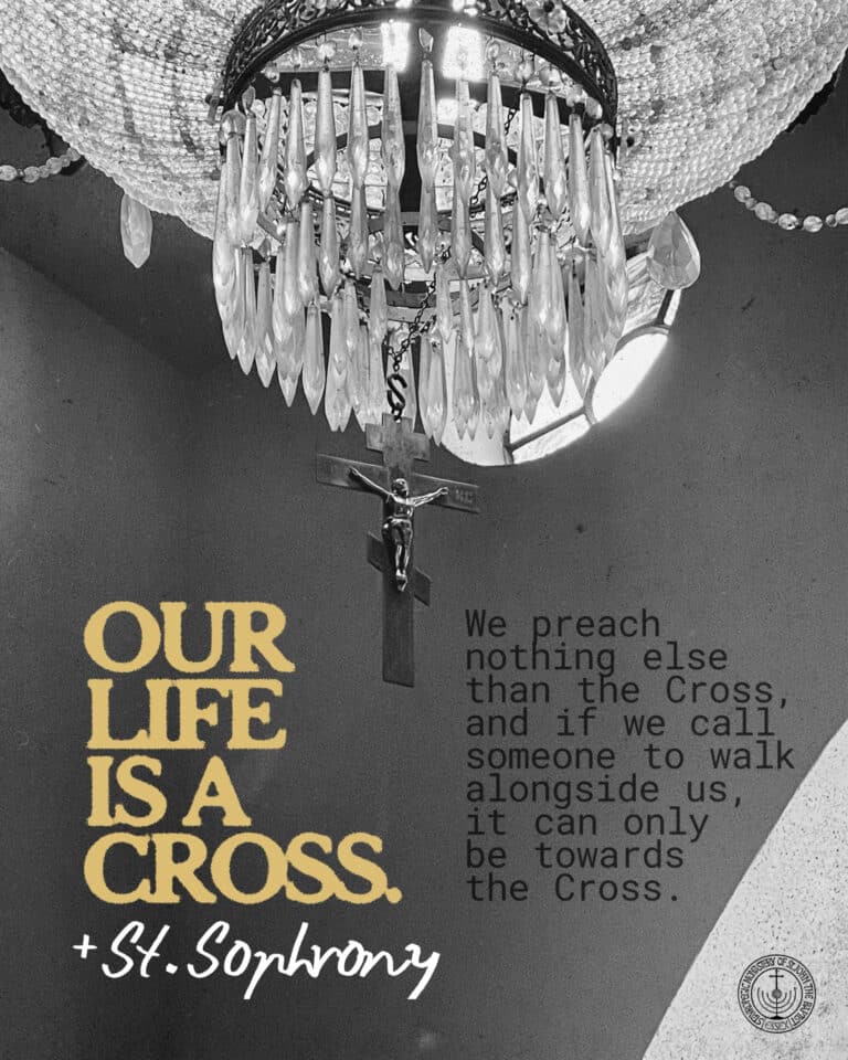 Chandelier above a crucifix with St. Sophrony quote: "Our life is a cross.