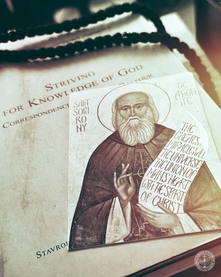 Saint Seraphim of Sarov praying with a scroll: "The union of man's heart with the spirit of Christ.