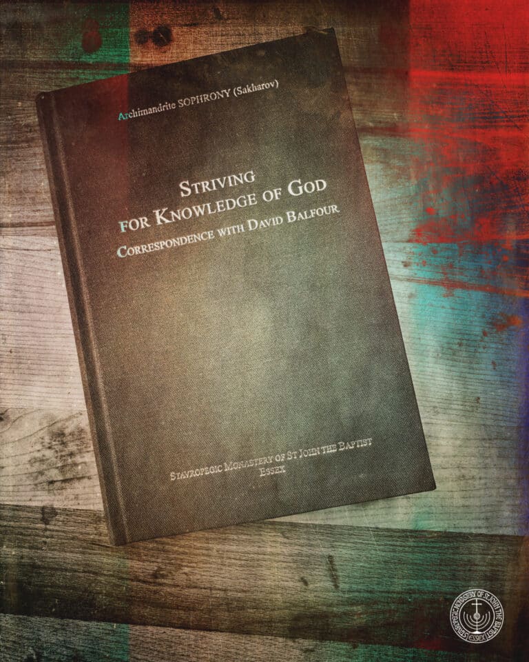 Archimandrite Sophrony's book, "Striving for Knowledge of God," on a wooden surface.