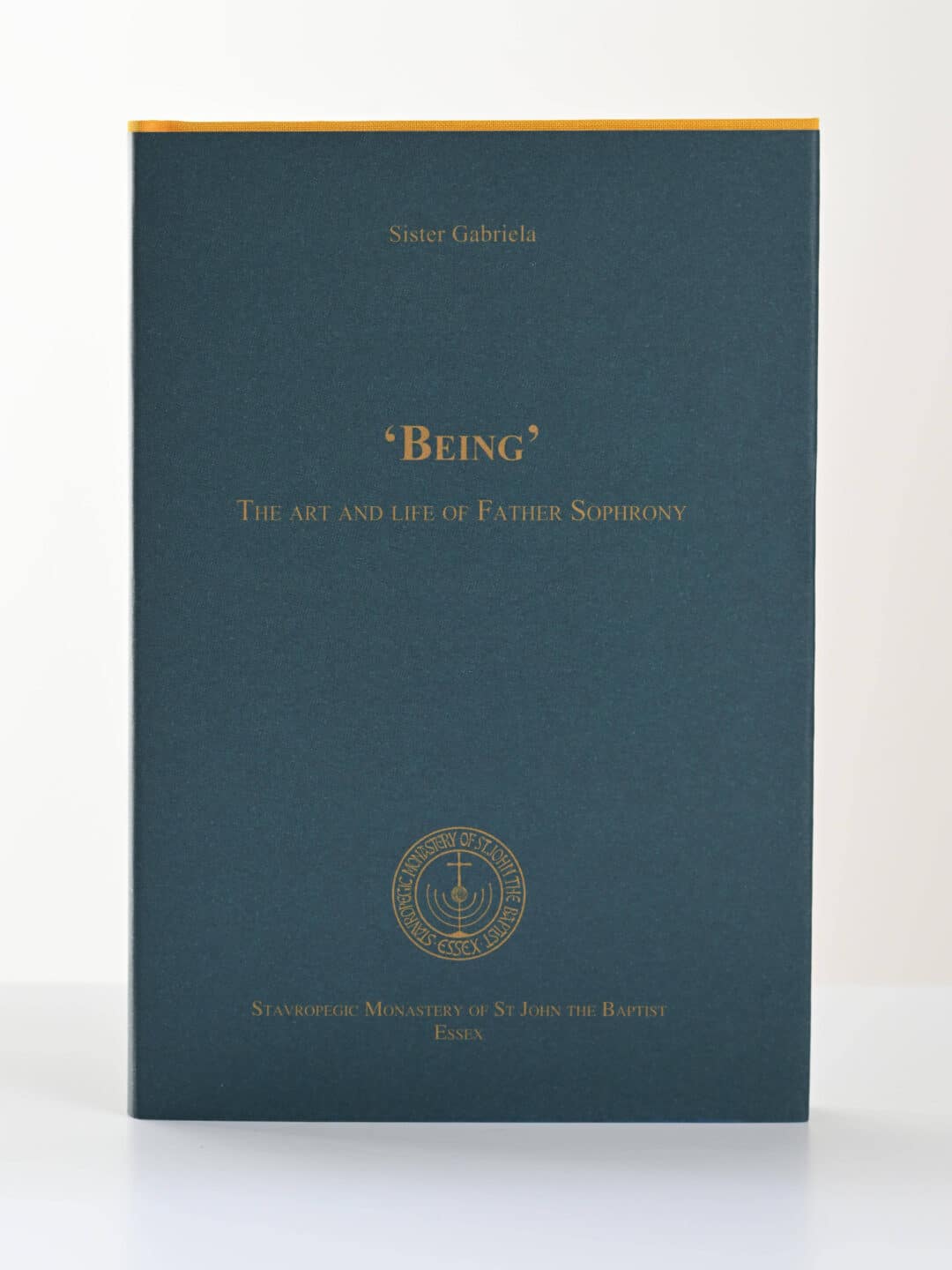 Dark blue book titled 'Being' by Sister Gabriela, St John the Baptist Monastery
